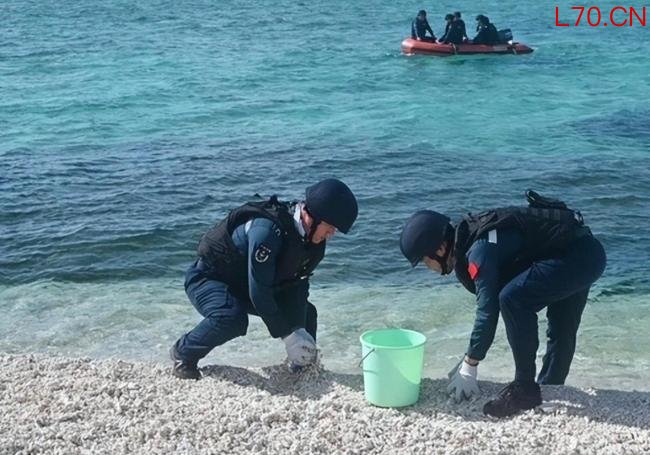 中国海警登铁线礁展示五星红旗 果断执法宣示主权